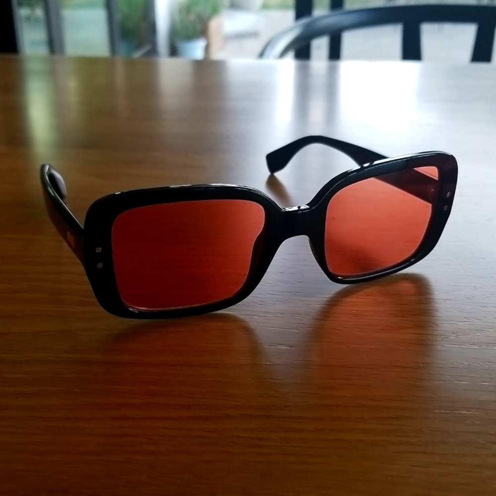 Sunglasses Le Specs / solid and striped brown/orange lenses in black frame NEW
